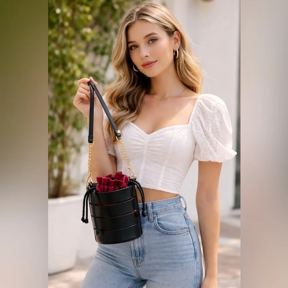 Unknown Elegant Black Bucket Bag with Gold Chain.   Contemporary Minimalism